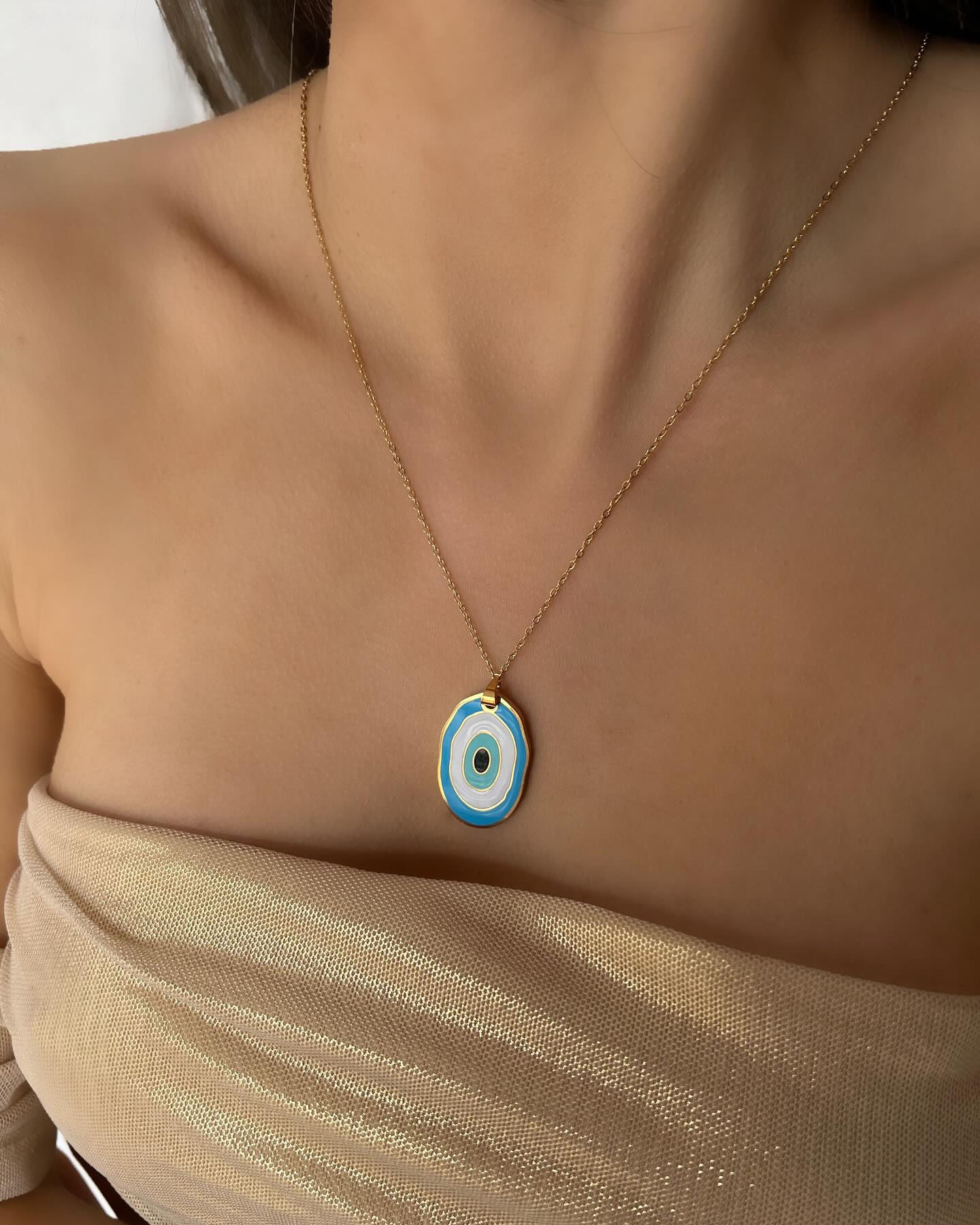 Large evil eye design, a protective necklace that blends bold style with timeless symbolism.