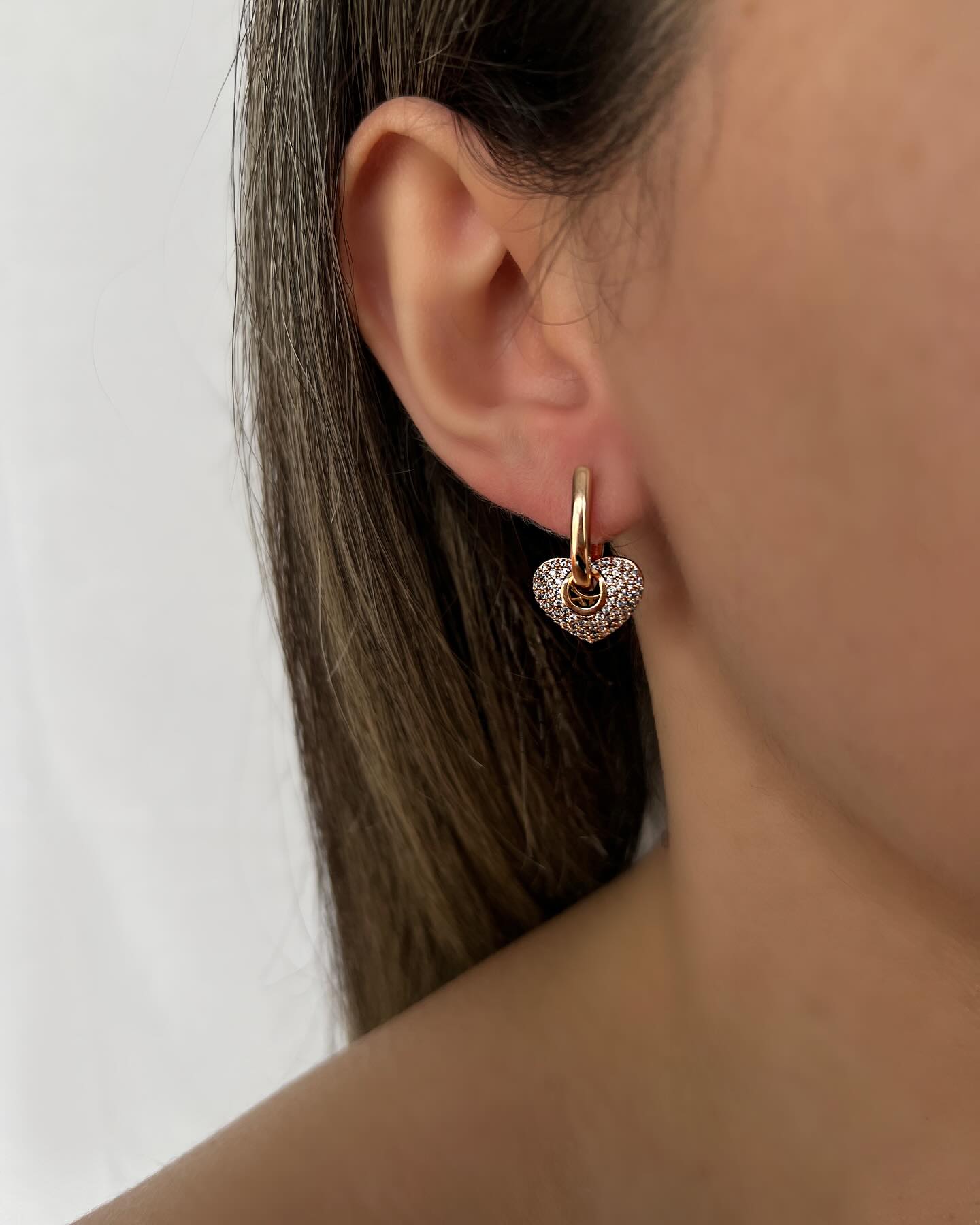 Large heart charm design, a bold pair of earrings that radiates love and confidence.