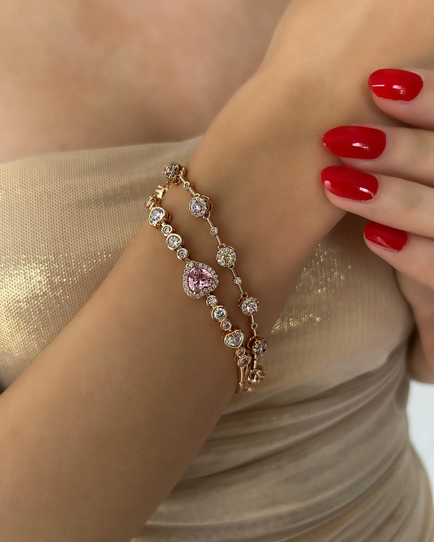 Two-piece pink diamond heart-cut design, a romantic bracelet set that shines with elegance and charm.