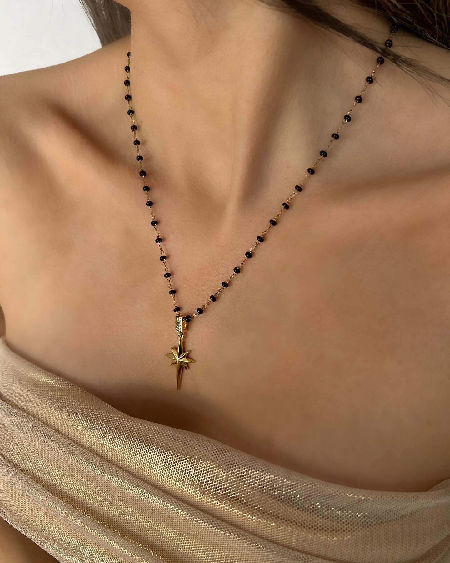 North Star charm with a small diamond detail, a delicate necklace that captures celestial beauty.